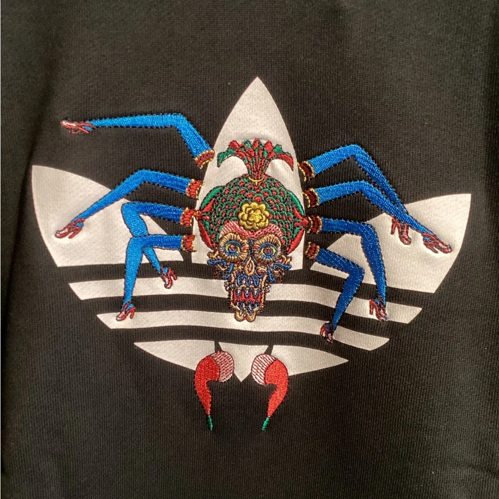 adidas sweatshirt featuring